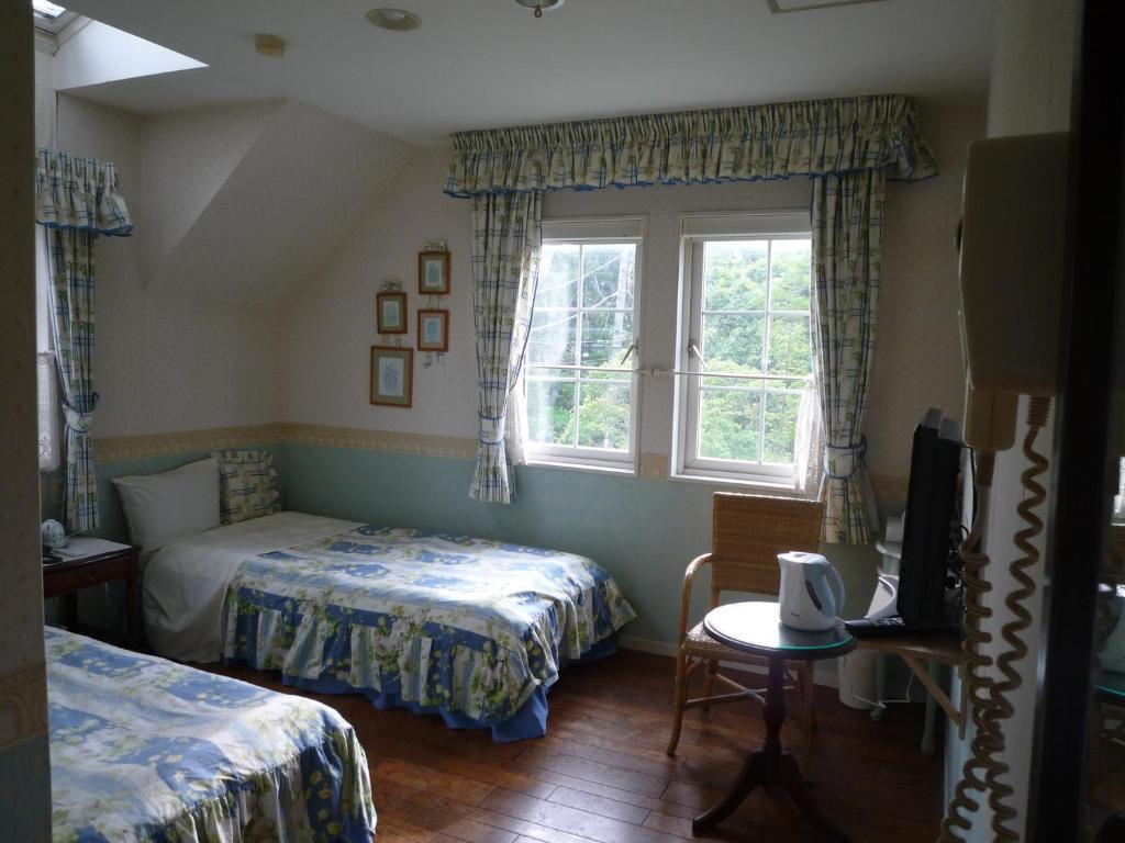 Avonlea Hotel Ито Стая снимка